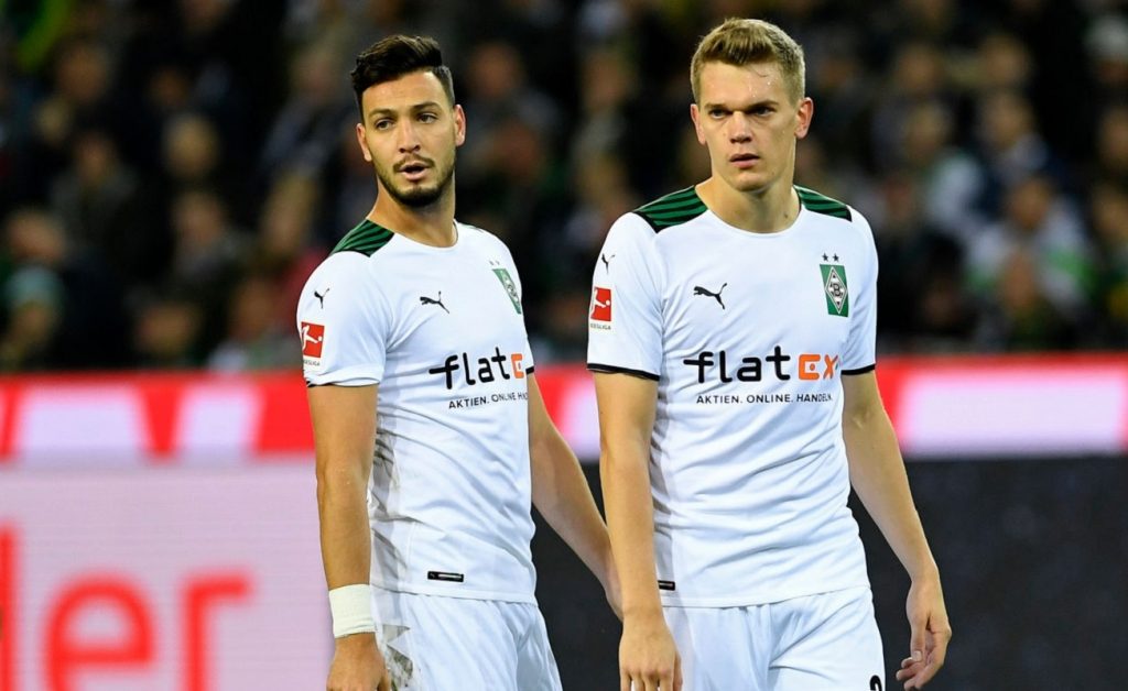 Bensebaini e Ginter