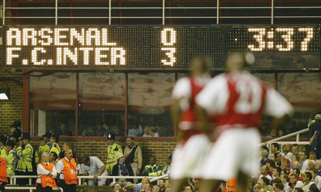 Patrick Vieira and Sol Campbell with the scoreboard