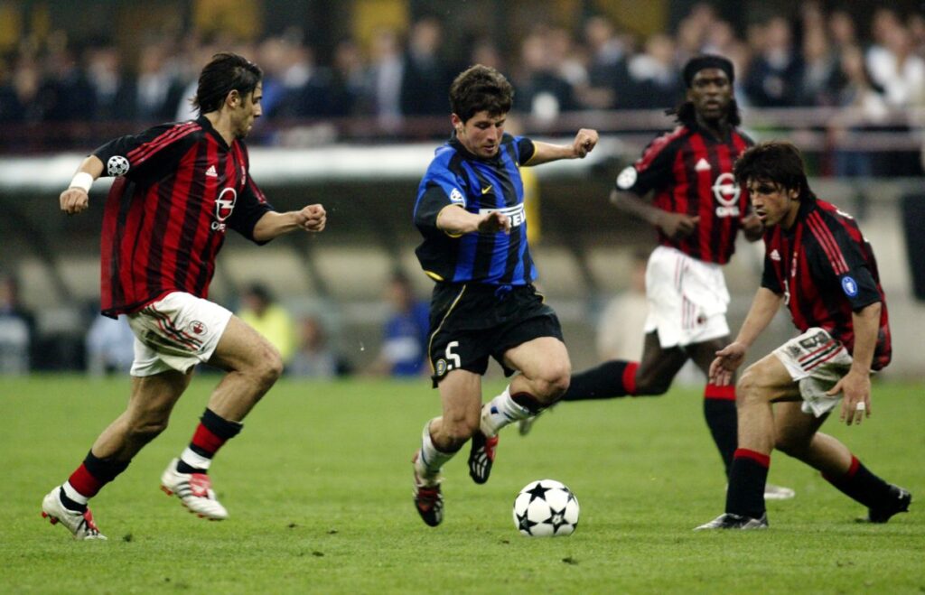 Emre Belozoglu of Inter Milan and AC Milan players Rui Costa, Clarence Seedof and Gennaro Gattuso