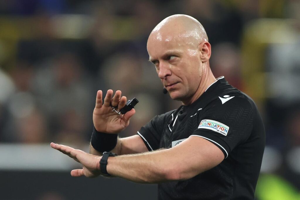 Referee Szymon Marciniak