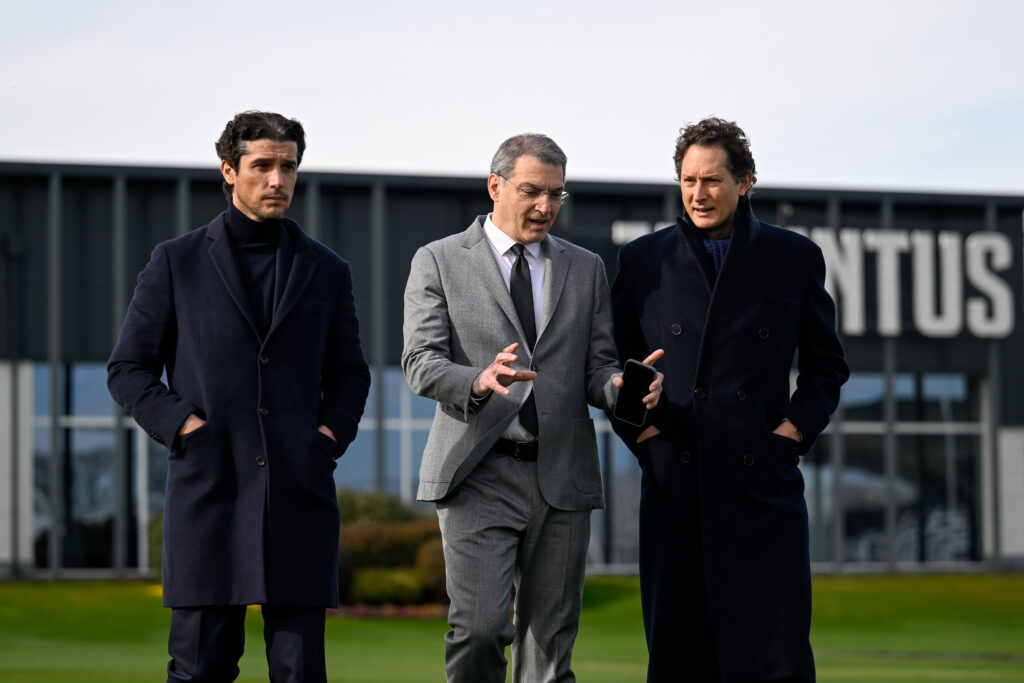 Elkann Comolli